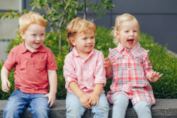 three childrens smiling