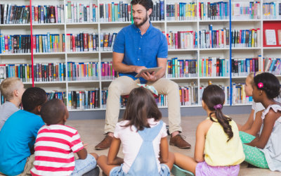 teacher and kids on the library