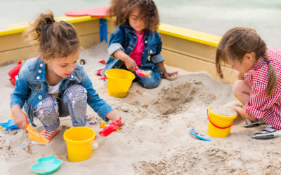 childrens playing in sand box